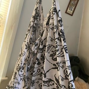 This shirt goes around your neck and it’s open in the back